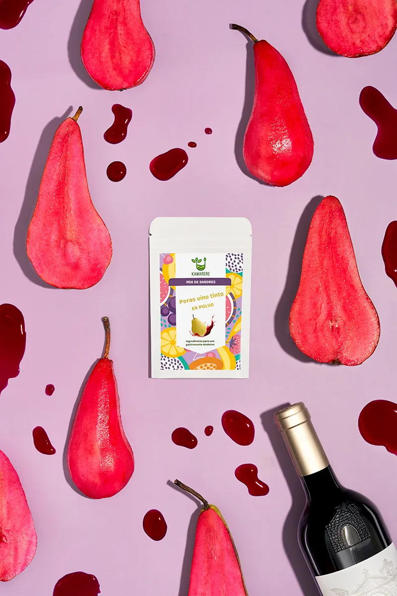 A commercial photograph of Kamarere’s 100% natural dehydrated fruit and vegetable powder in a resealable white pouch. The colorful label features a modern, vibrant fruit and vegetable pattern with the Kamarere logo at the top. The packaging highlights its preservative-free and additive-free composition, emphasizing its use for innovative cooking and gastronomy. The label includes an illustration representing fresh ingredients, reinforcing its natural origin.